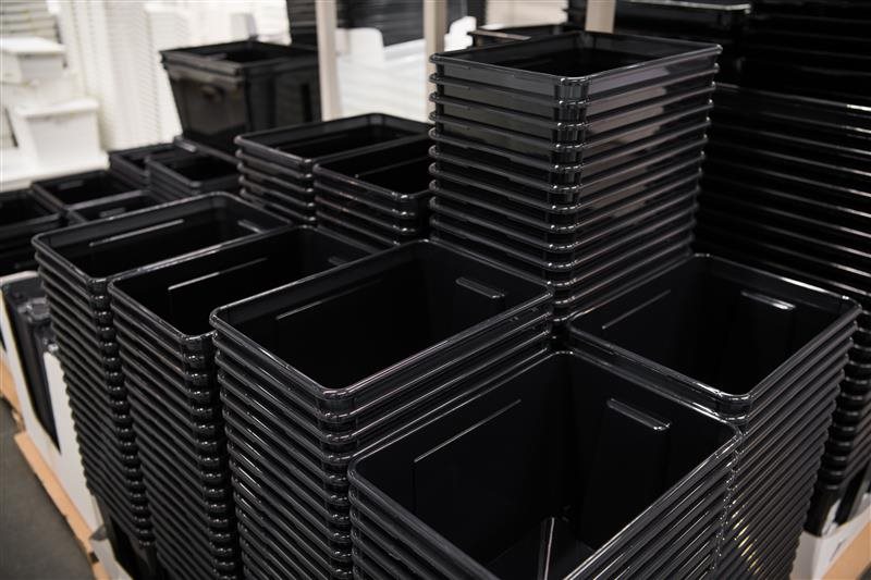 A stacked collection of tote boxes